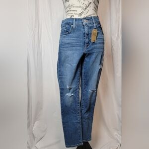 Levi's 311 Distressed Shaping Skinny Mid Rise Jeans in Medium Blue